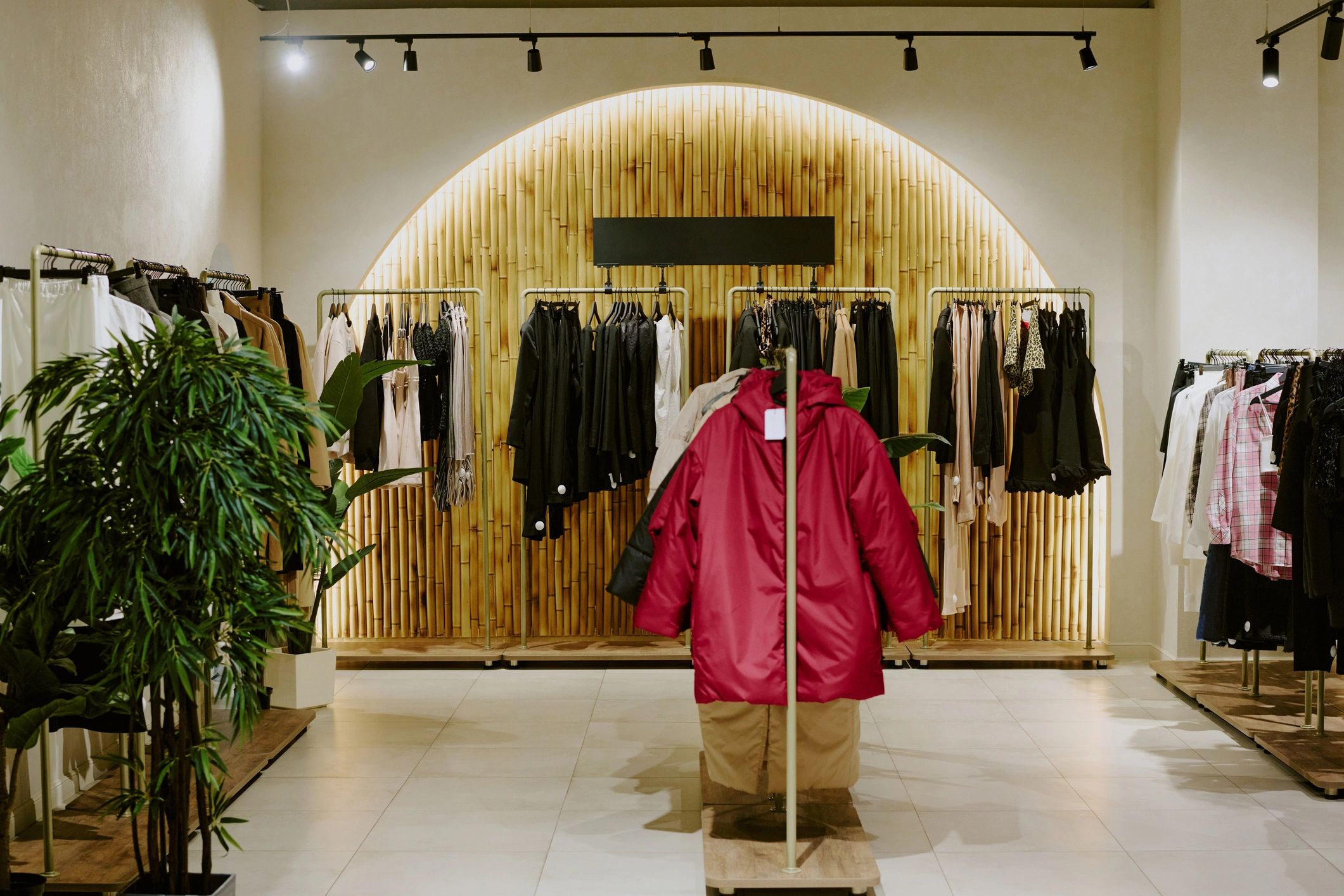 Elegant women's fashion boutique interior with clothing displays