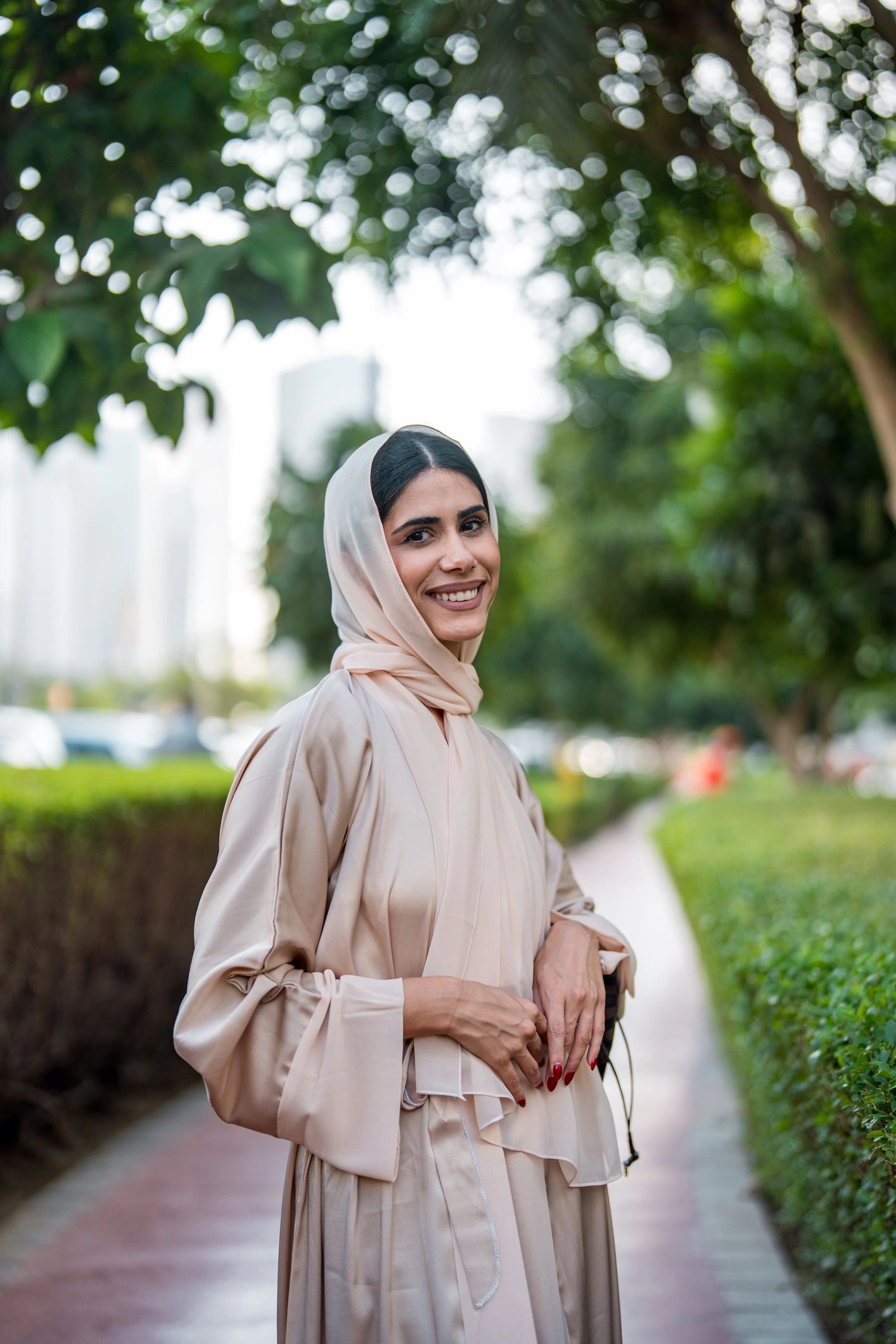 Satisfied boutique client in elegant modest fashion